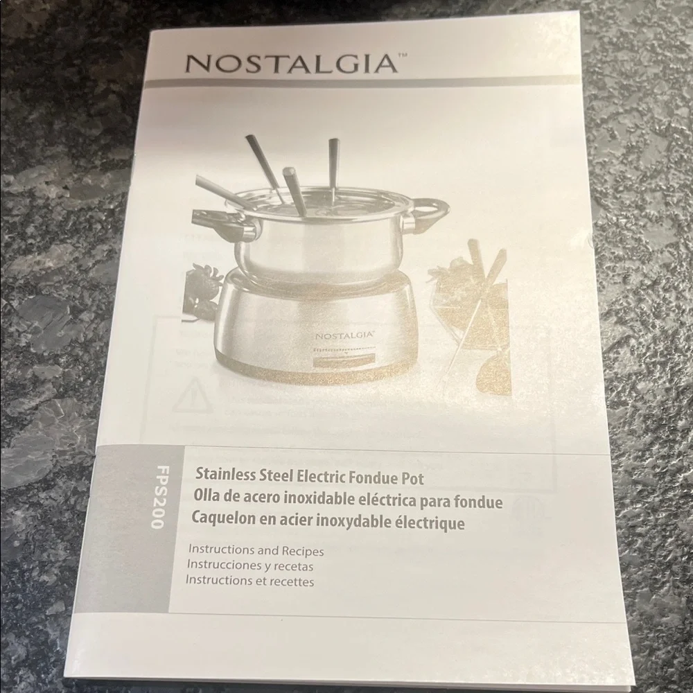 Nostalgia Electric Silver Fondue Set with Black Handles. 6 Forks